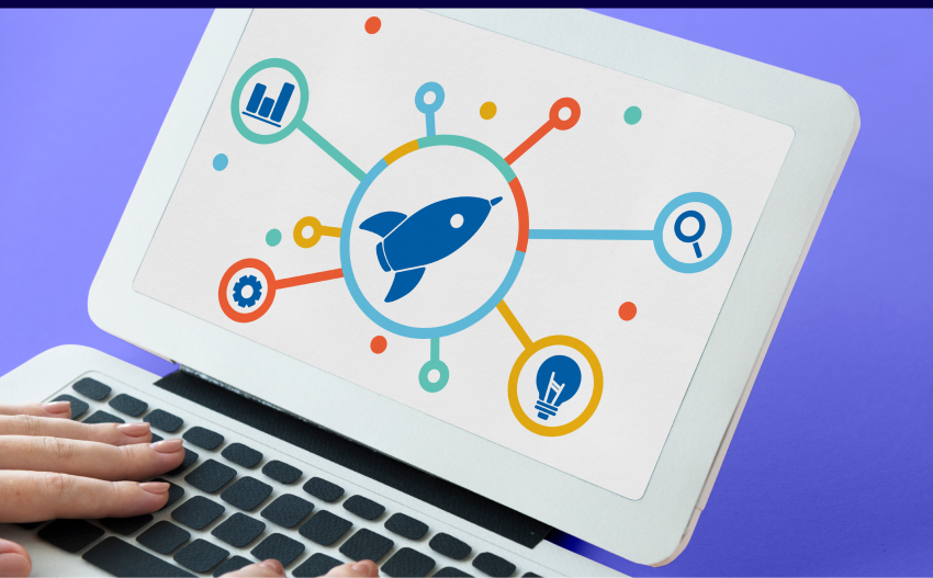 Digital marketing strategy: a laptop screen showing a rocket launch with interconnected business growth icons.