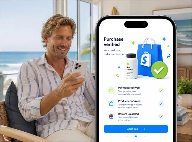 Man viewing confirmation that a qualifying Shopify product purchase was verified and the reward unlocked.
